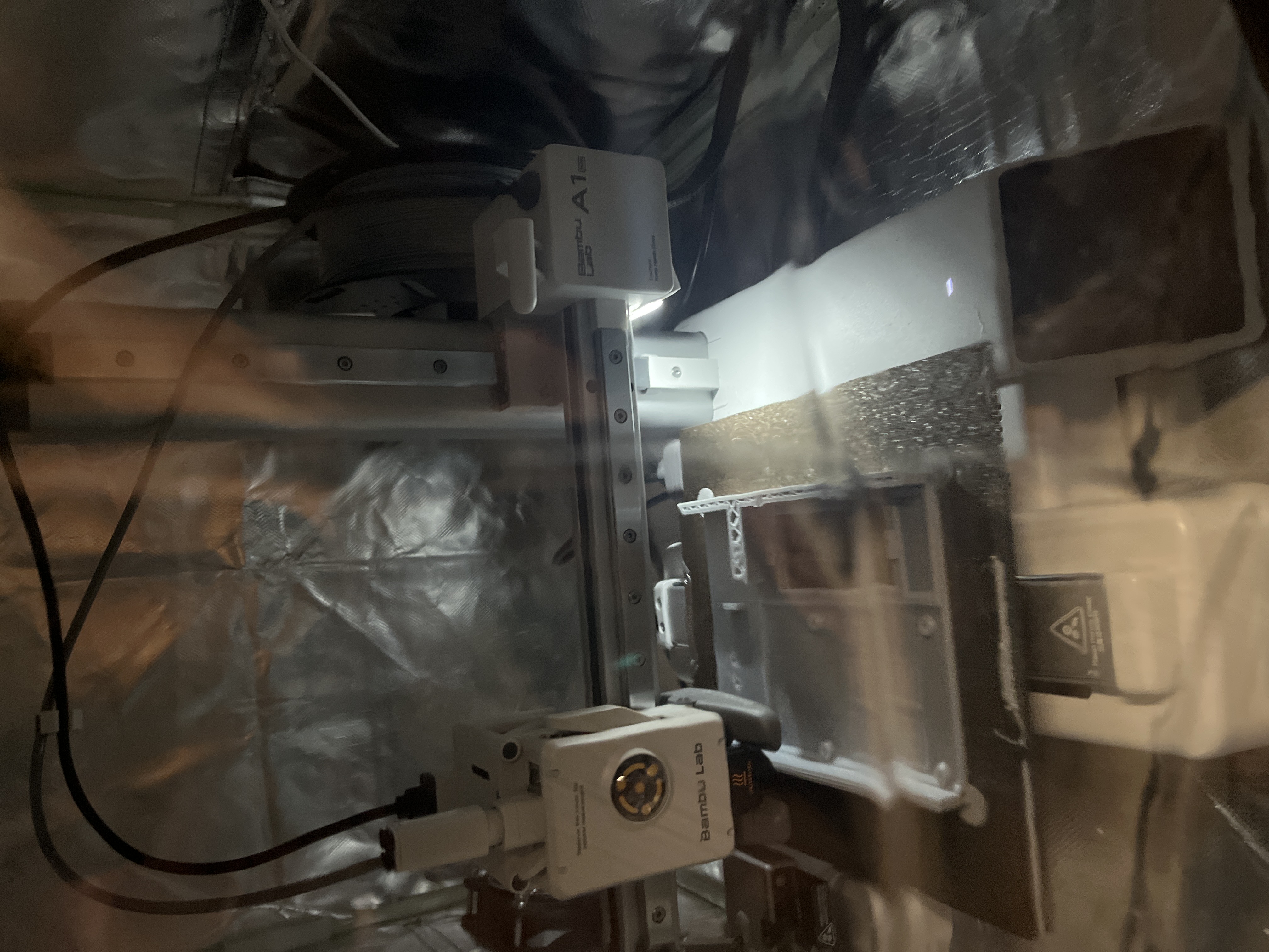 Bambu Labs A1 Mini under my dorm desk